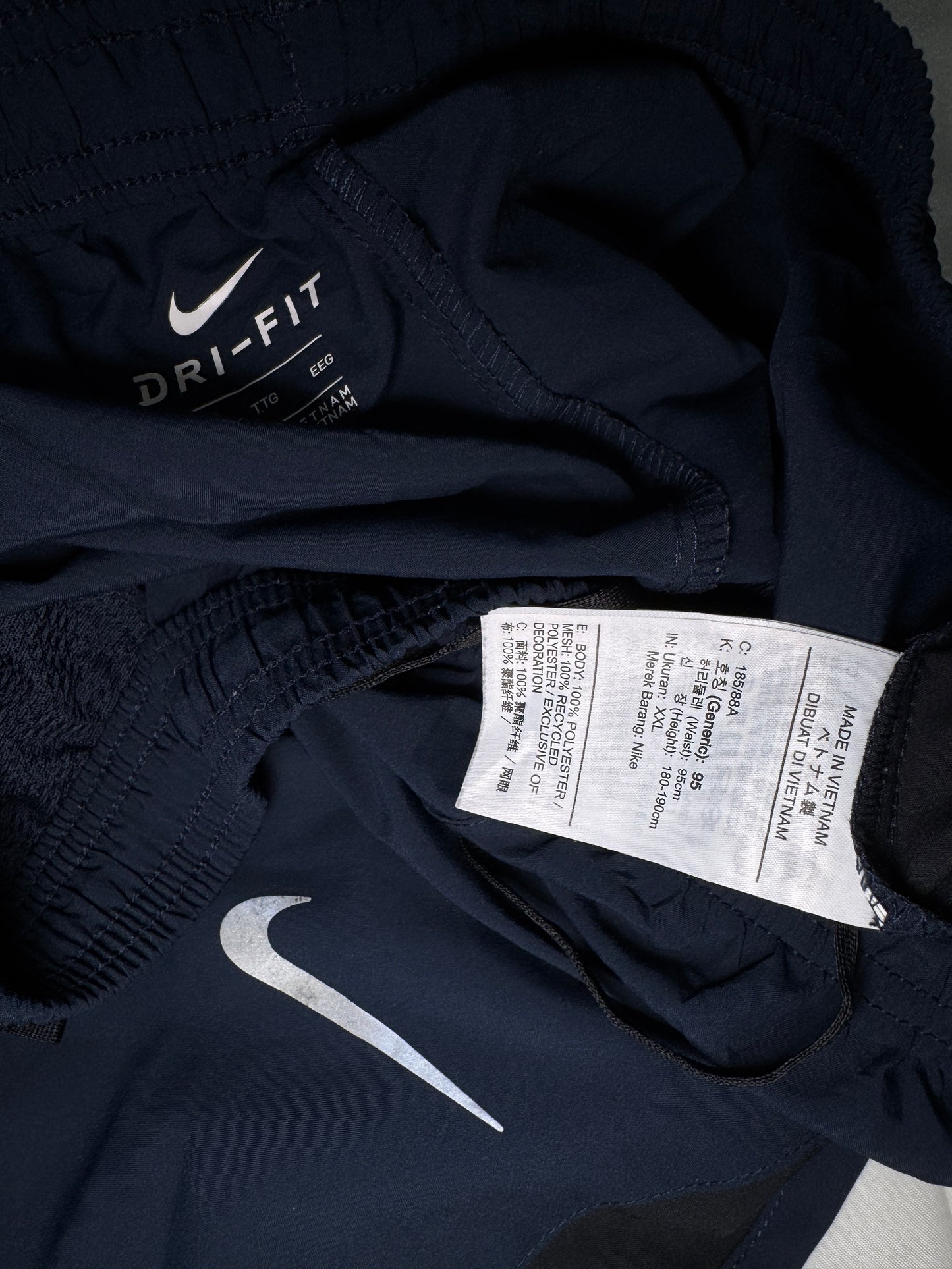 Navy Blue ‘Nike’ Reflective Swoosh Pant
