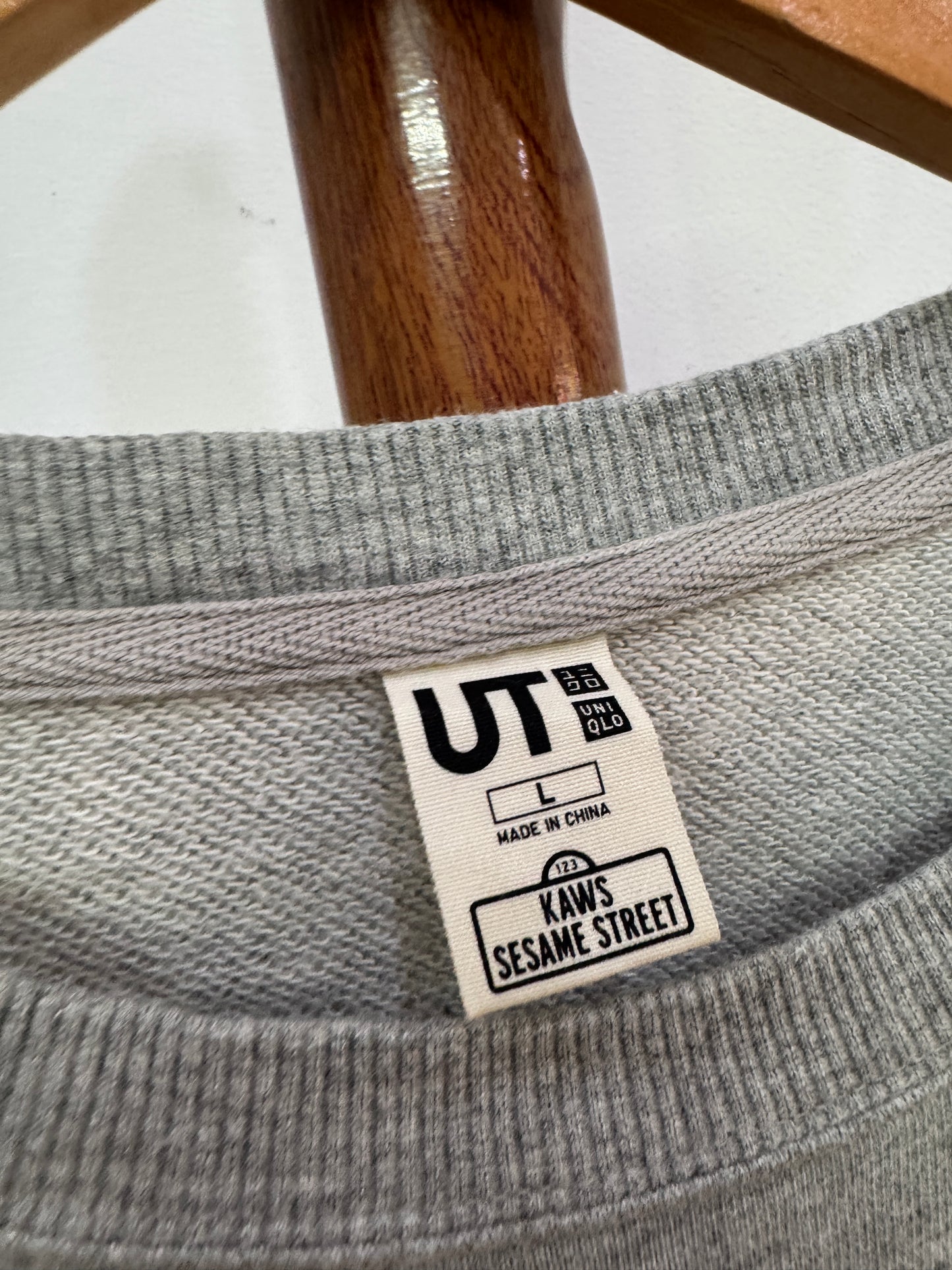 Fav! Uniqlo x Kaws Sweatshirt Beige