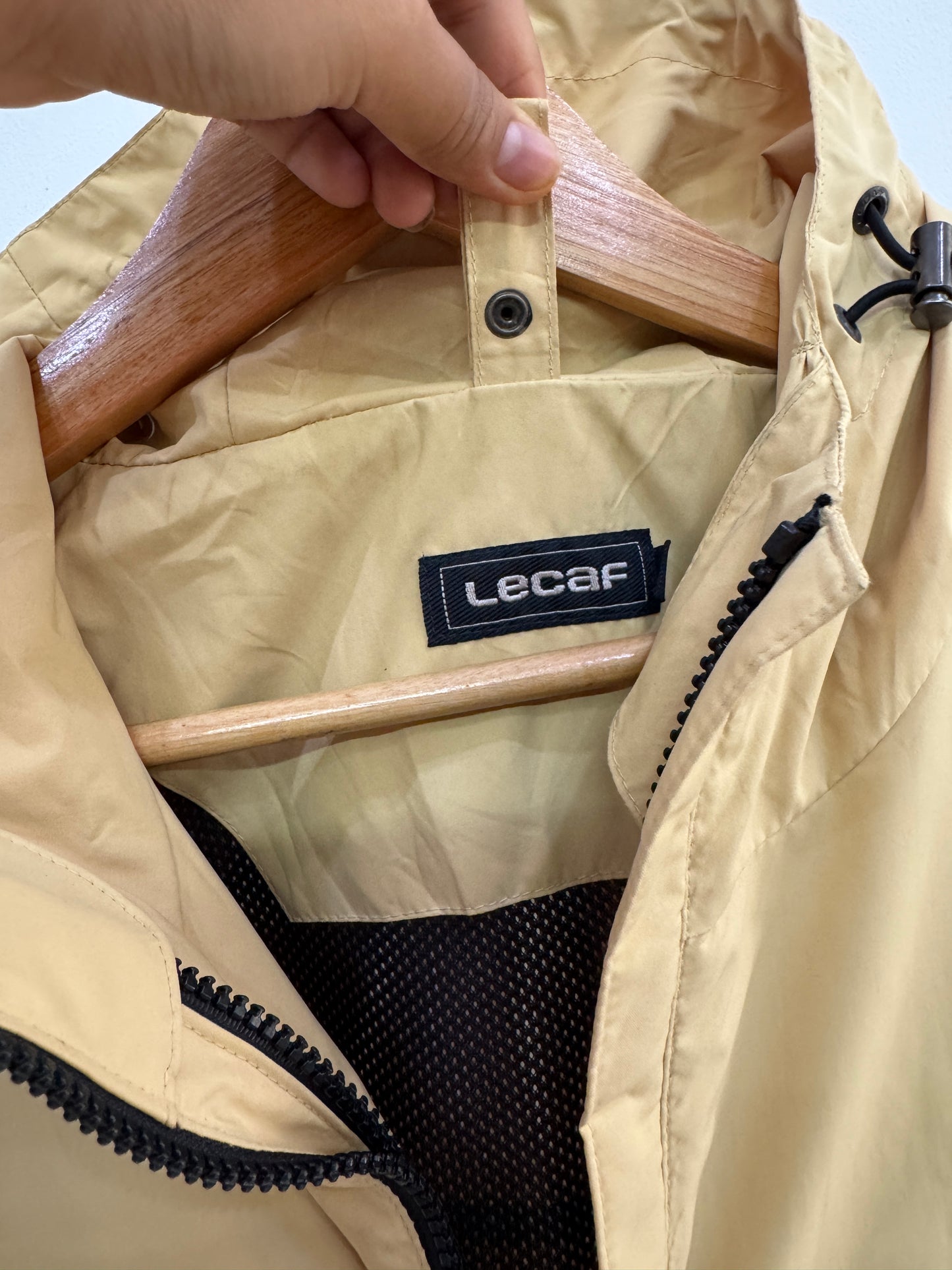 Solid pale yellow outdoor jacket