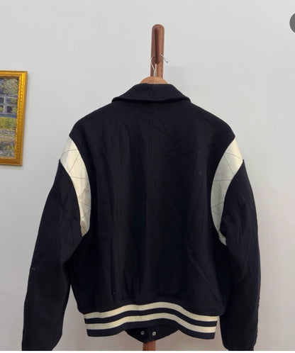 Favourite 😻 

'BIRTHDAYSUIT' Wollen Varsity with leather details