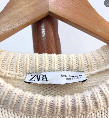 B/W Striped Zara Knitted Sweater 
Minimal & A must have
